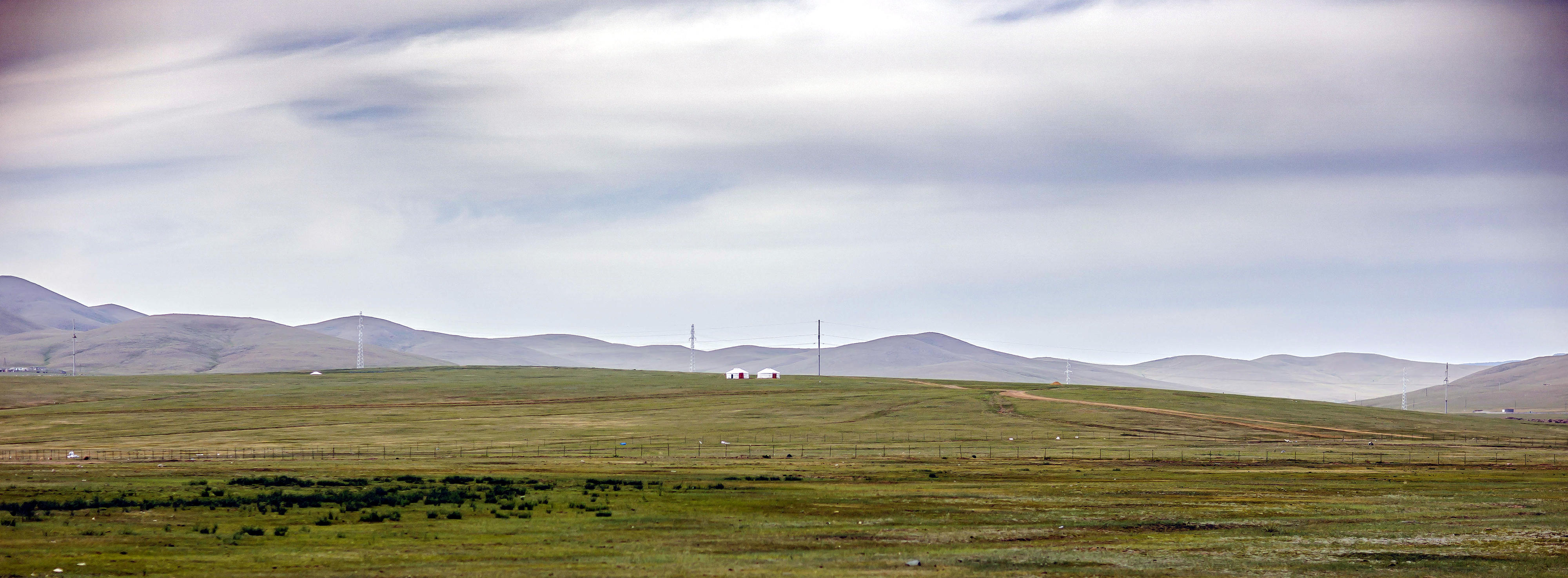 Two yurts in the steppe near Nalaikh, Mongolia