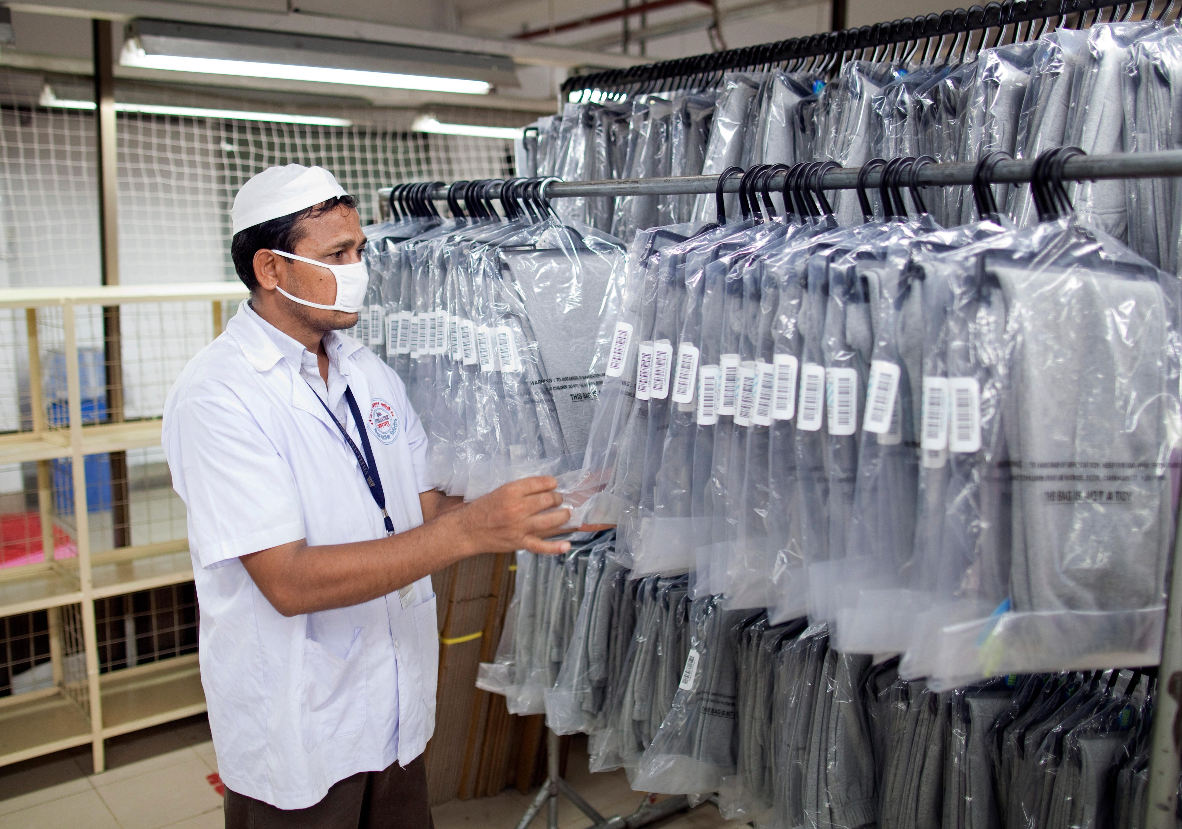 Final inspection of garments in a textile factory in Bangladesh