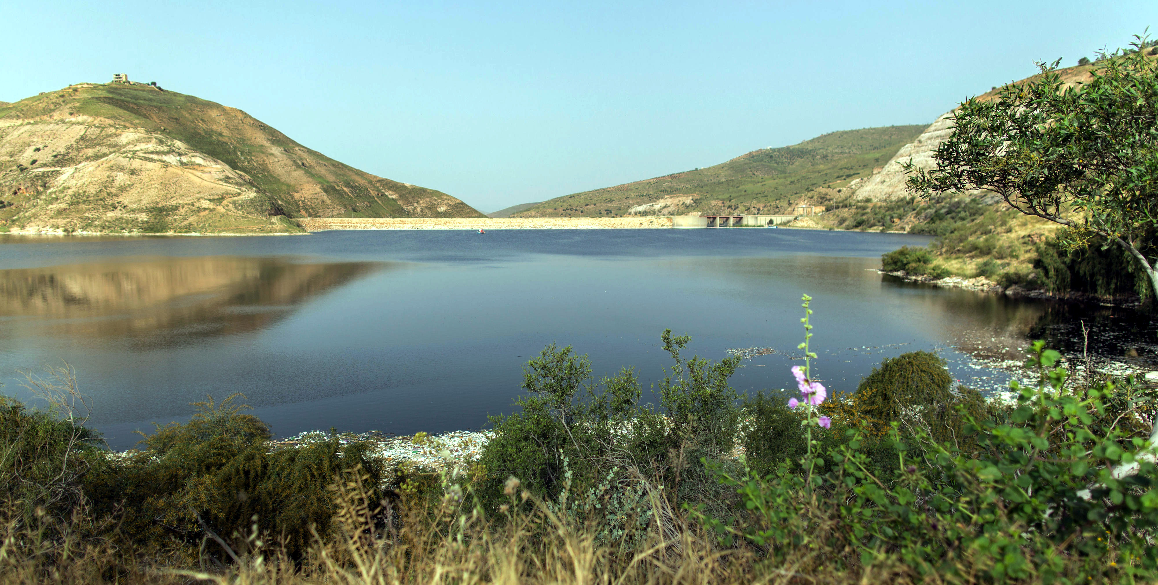 View of a reservoir with dam wall at the King Talal Dam, Jordan