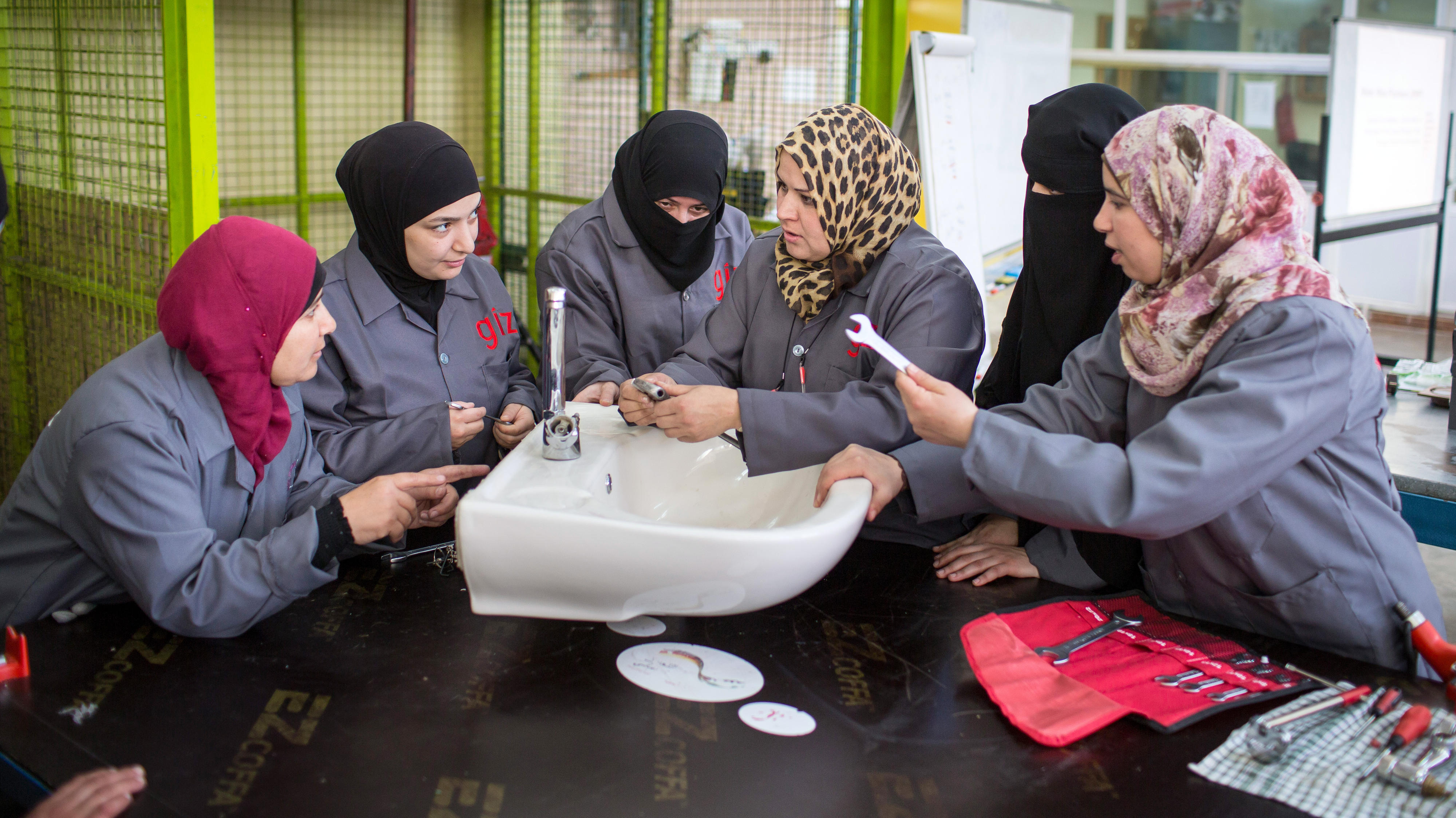 Training Syrian refugees as plumbers in Jordan