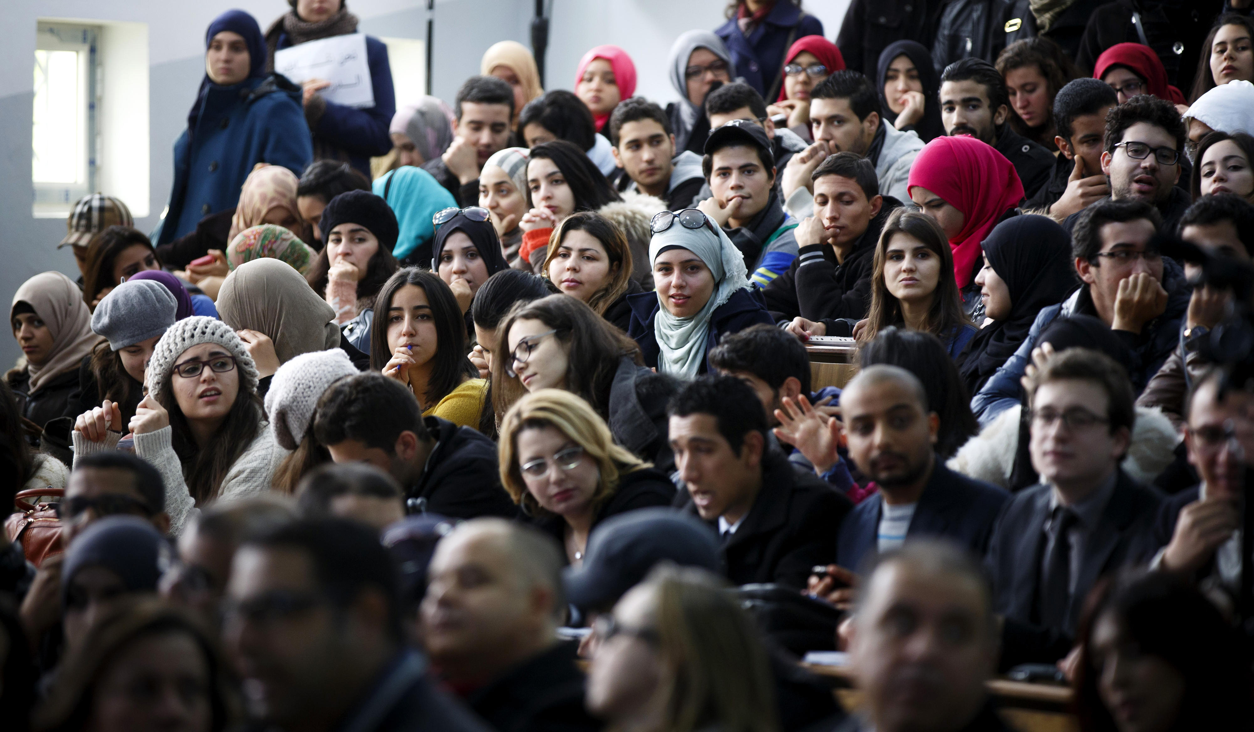 Students sit in a lecture hall at the University of Tunis El Manar